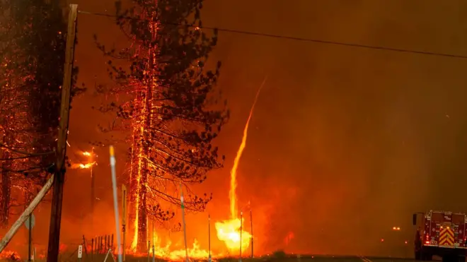 A whirl of fire shoots up into the draft of a PyroCb in California, July 2020, which saw some of the most devastating fires in US history