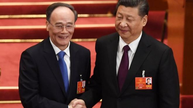Wang Qishan (L), former secretary of the Central Commission for Discipline Inspection, shakes hands with China"s President Xi Jinping as he is elected as China"s vice president during the fifth plenary session of the first session of the 13th National People"s Congress (NPC) at the Great Hall of the People in Beijing on March 17, 2018. China"s rubber-stamp parliament unanimously handed President Xi Jinping a second term on March 17 and elevated his right-hand man to the vice presidency, giving him a strong ally to consolidate power and handle US trade threats. / AFP PHOTO / Greg BakerGREG BAKER/AFP/Getty Images