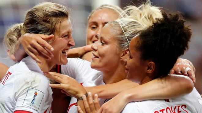 Ellen White (left) celebrates scoring England's first goal
