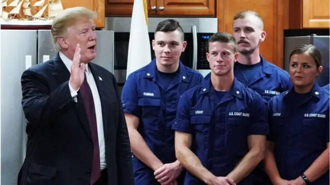US President Donald Trump visits with personnel at US Coast Guard Station Lake Worth Inlet in Riviera Beach, Florida, on Thanksgiving Day