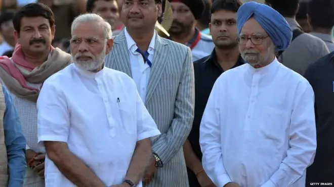 મોદી અને મનમનોહનસિંઘ