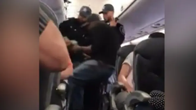 пасажир United Airlines