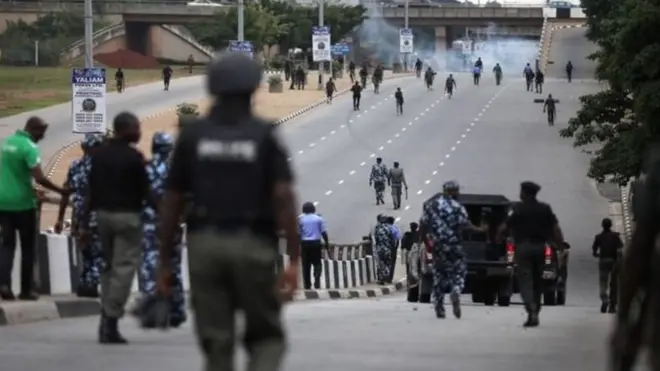 Police and Shiite members clash during protest