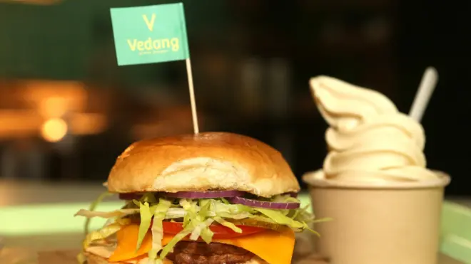 A vegan seitan burger is seen at the Vedang fast food restaurant in the Mall of Berlin on May 18, 2019 in Berlin