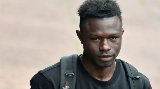 Mamoudou Gassama life change afta im climb one storey building to rescue pikin wey hang for balcony for Paris