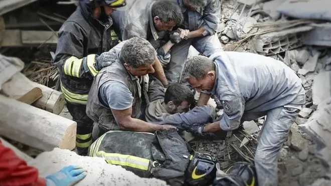 Rescue workers free man from rubble