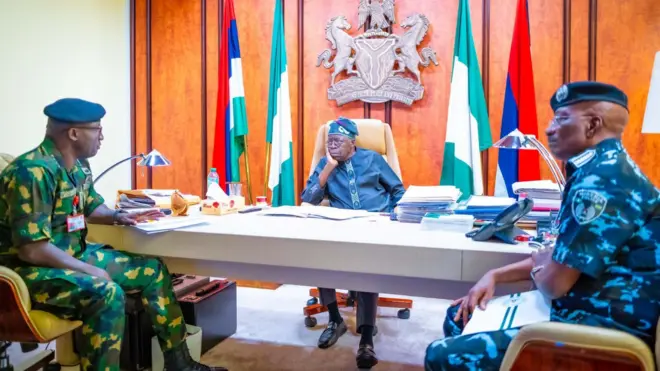 Nigeria President Bola Tinubu wit service chiefs