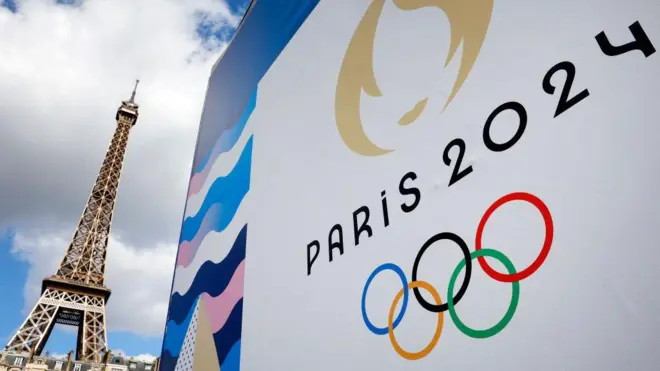 imagen del logo de las olimpiadas de parís 2024 con la torre eiffel de fondo 