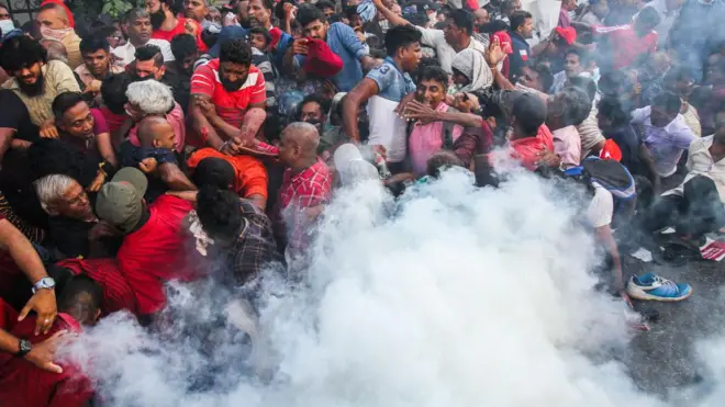 Police are using water cannons and tear gas to disperse the activists of the National People's Power or Jathika Jana Balawegaya protest demanding the government to hold the local government elections, in Colombo on February 26, 2023
