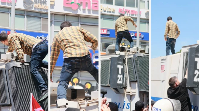 İzmir'de Özgür Özel'in mitingi öncesinde polis müdahalesi sırasında TOMA'ya çıkan öğretmen