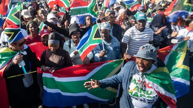 Pipo hold South Africa flag
