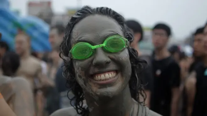 A reveller at the Boryeong Mud Festival