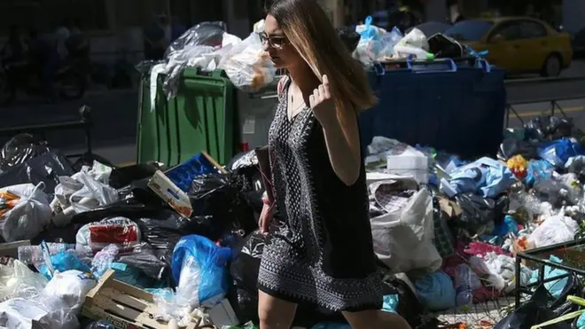As the rubbish piles up, authorities in Athens have asked residents not to take their refuse out