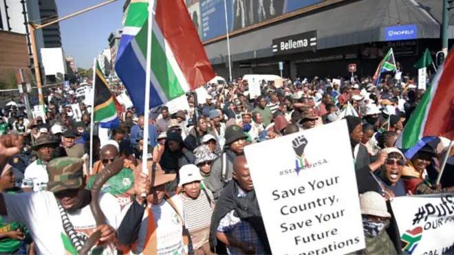 Various groups protest during one march against illegal immigrants on June 30, 2026 for Pretoria, South Africa.
