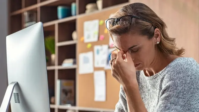 Staged picture of woman at computer