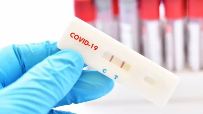 Positive test result by using rapid test device for COVID-19 virus