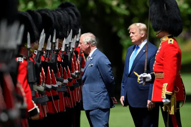 US President Donald Trump inspects a guard of honour with Prince Charles, Prince of Wales at Buckingham Palace on June 3, 2019 in London, England.