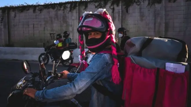 A delivery worker takes part in a demonstration against delivery apps on 25 July, in Belo Horizonte, Brazil