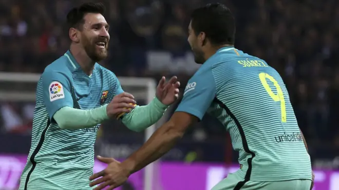 Lionel Messi and Luis Suarez