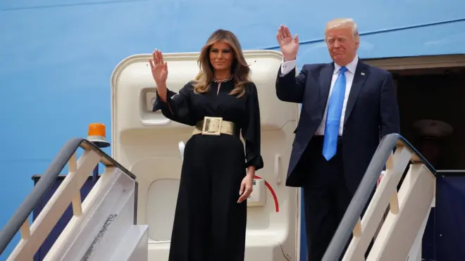 U.S. President Donald Trump and first lady Melania Trump wave as they arrive in Riyadh, Saudi Arabia, May 20, 2017