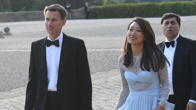 Jeremy Hunt and Lucia Guo arrive at Blenheim Palace for a dinner hosted as part of Donald Trump's visit
