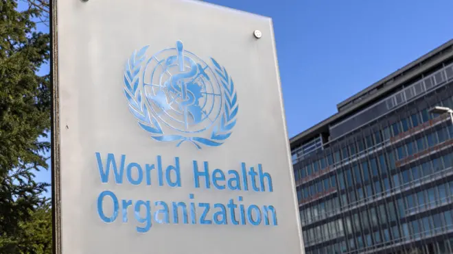 Вывеска у здания ВОЗ