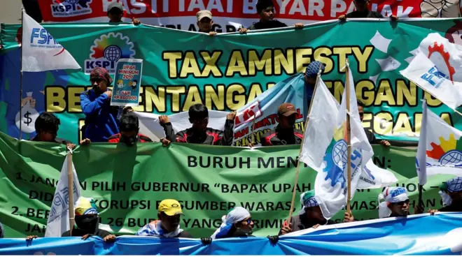 Beberapa serikat buruh menggelar aksi unjuk rasa menentang Pengampunan Pajak atau Tax Amnesty pada September 2016.