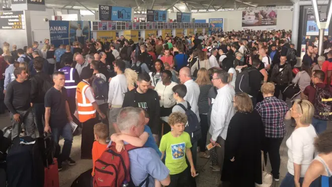 Passengers whose flights have been cancelled are waiting to see if they can re-book