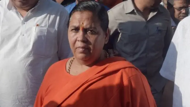 Uma Bharti (centre) said she ordered suspected rapists to be hung upside down and beaten