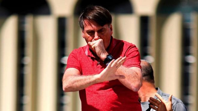 Bolsonaro coughs while addressing his supporters protesting against lockdown measures, 19 April 2020