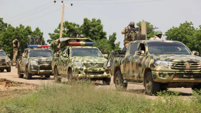 Nigerian soldiers patrol on October 12, 2019, after gunmen suspected of belonging to the Islamic State West Africa Province (ISWAP) group raided the village of Tungushe, killing a soldier and three residents