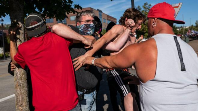 Black Lives Matter protester scuffles with Trump supporter in Portland, 29 August 2020