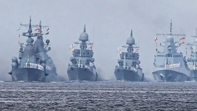 Russian Navy sailors onboard warships during the "Russia Navy Day" parade in Kronstadt, outside St Petersburg, Russia, 28 July 2019