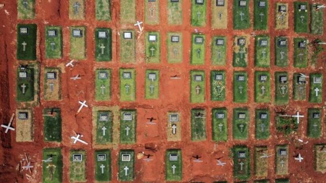 An aerial view shows the burial area provided by the government for victims of the coronavirus disease (COVID-19), at Pondok Ranggon cemetery complex, in Jakarta, Indonesia November 25, 2020