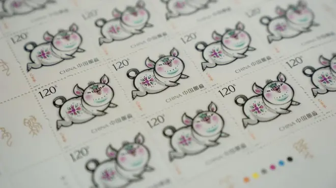The Year of the Pig stamps have a 'happy family' theme