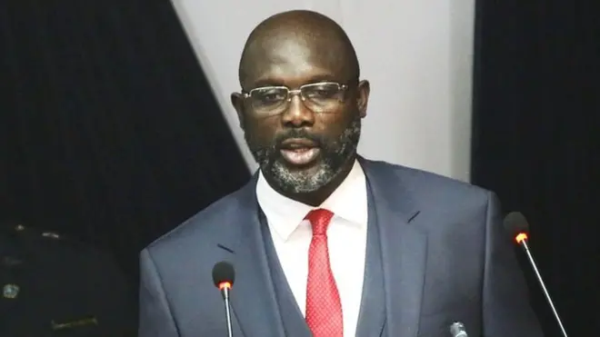 George Weah bụ onye egwuregwu AC Milan na Chelsea mgbe ọ na-agba bọọlụ