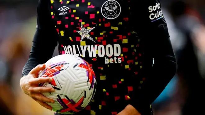 ተፃዋቲ ኩዕሶ ምስ ናይ ቁማር (ውርርድ) ማልያ