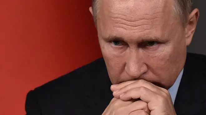 Путін