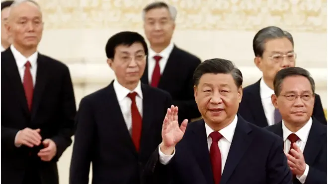 Mr Xi walked out in the Great Hall of the People trailed by the Standing Committee members