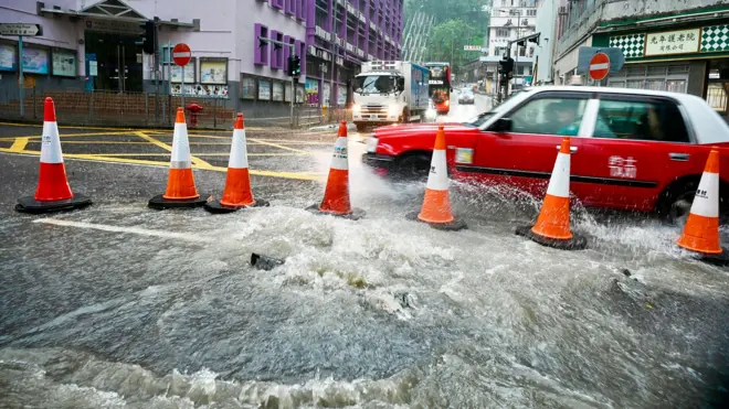 hk taxi on the flooded road