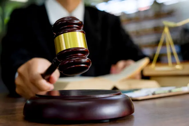 Judge gavel with Justice lawyers, Businessman in suit or lawyer working on a documents. Legal law, advice and justice concept.