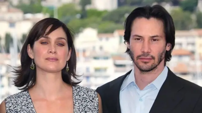 Carrie-Anne Moss ve Keanu Reeves