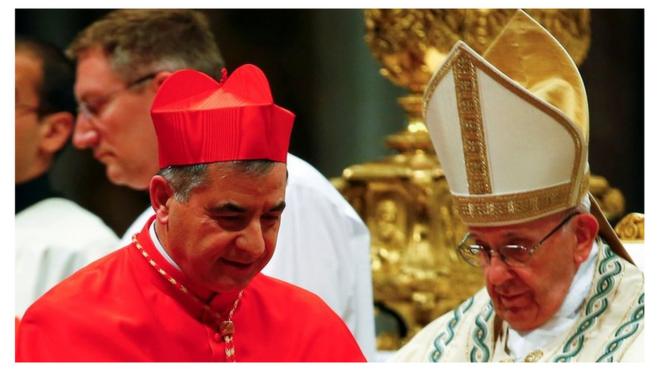 Cardinal Giovanni Angelo Becciu pictured with Pope Francis