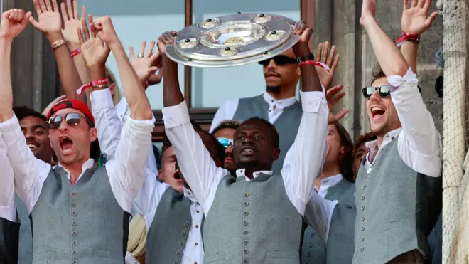Bayern Munich players with Bundesliga trophy