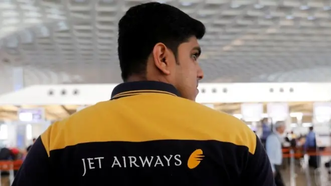 જેટ એરવેઝના ફરજરત કર્મચારીનો ફોટોગ્રાફ