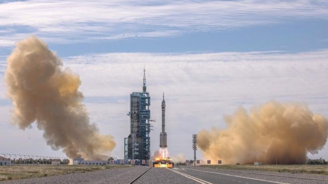 The Long March-2F carrier rocket, carrying the Shenzhou-12, takes off from the launch site at the Jiuquan Satellite Launch Center, in the Gobi Desert, Inner Mongolia, near Jiuquan, China, 17 June 2021.