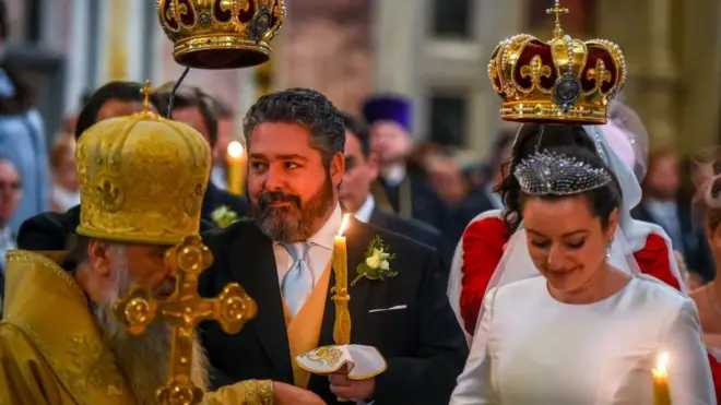Grand Duke George Mikhailovich Romanov, 40, and im Italian fiance Rebecca Virginia Bettarini, 39, say dia vows at di Saint Isaac's cathedral for di former imperial capital Saint Petersburg