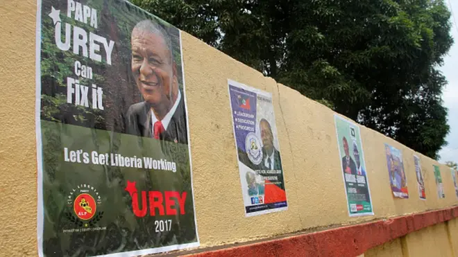 Campaign poster for Monrovia dey show picture of di Liberian Presidential Candidate