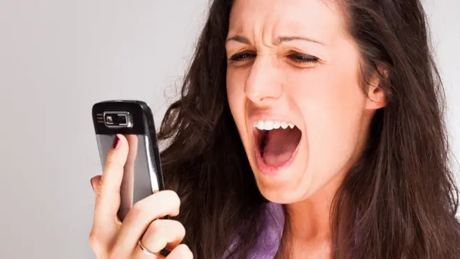 A woman using a phone