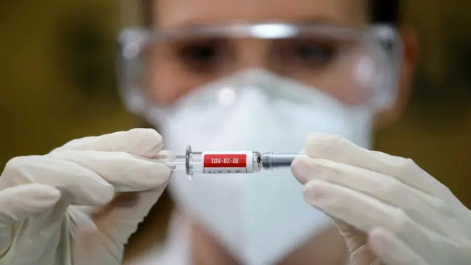 A nurse holds China&quot;s Sinovac vaccine, a potential vaccine for the coronavirus disease, in Porto Alegre, Brazil, in August 2020